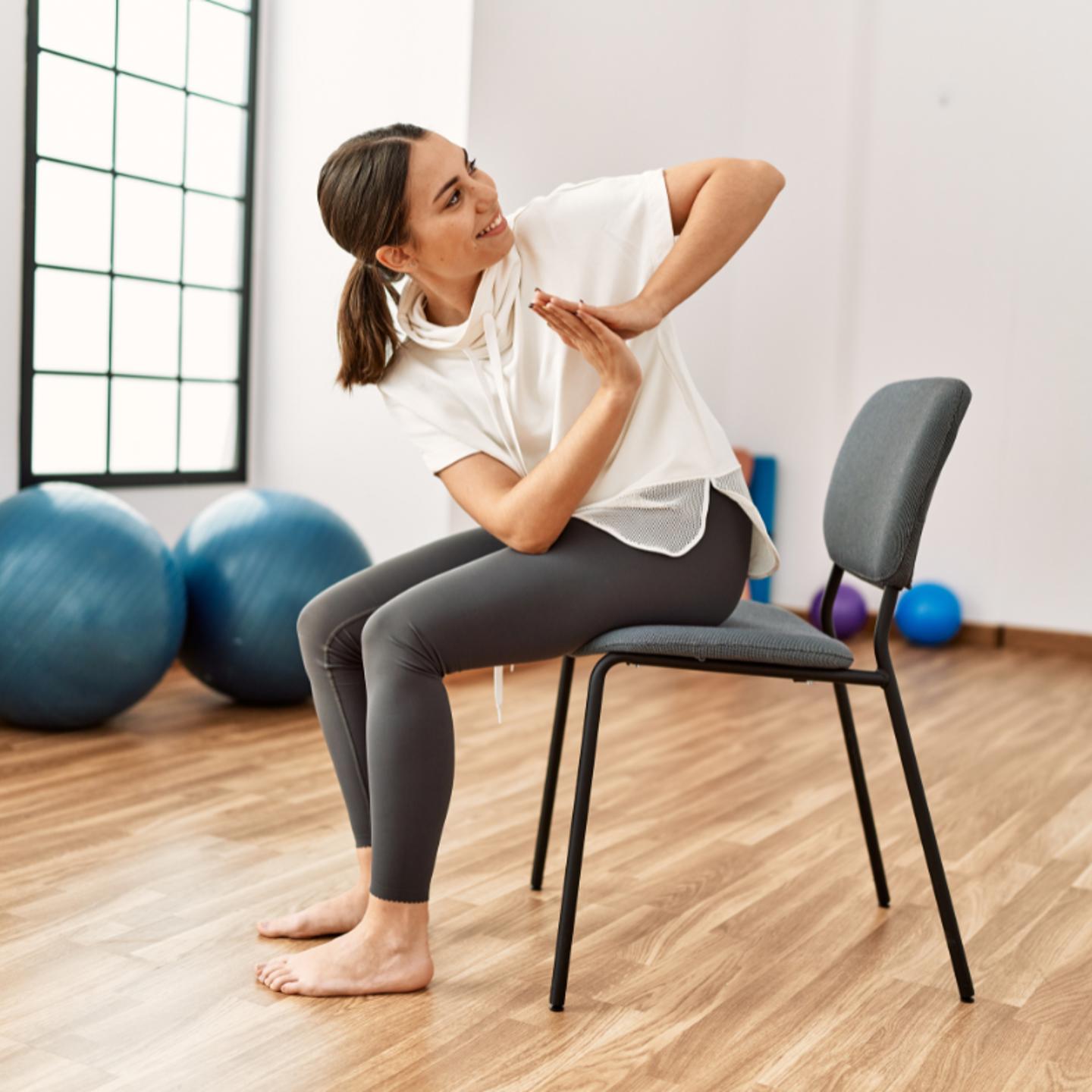 Photo of someone doing chair yoga