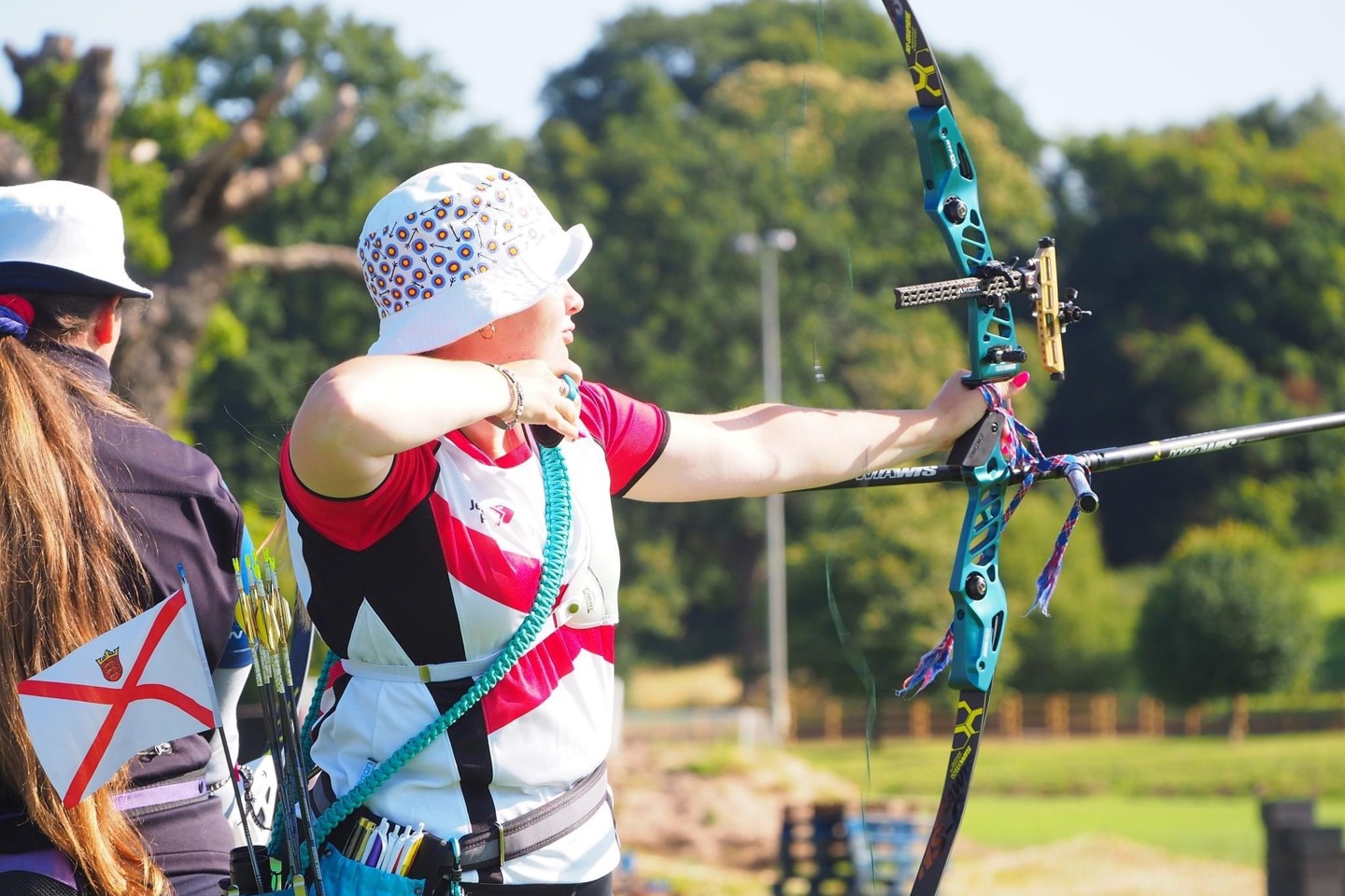 Photo of Mollie taking part in Archery