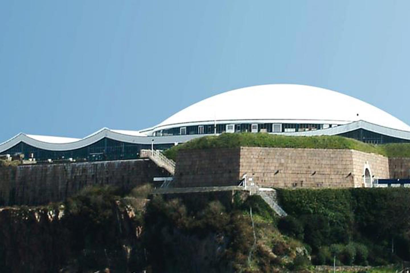 Photo of Fort Regent Dome, building and surrounding areas taken from a distance