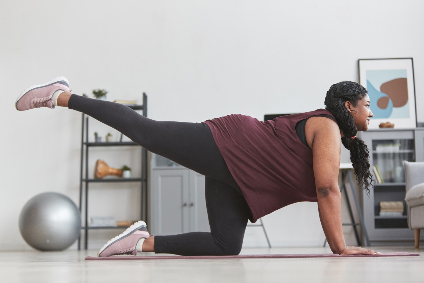 Woman doing yoga on the floor