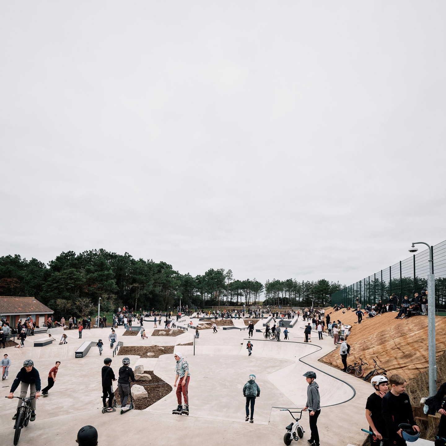 Photo of Les Quennevais Skatepark on opening day full of people using the facility