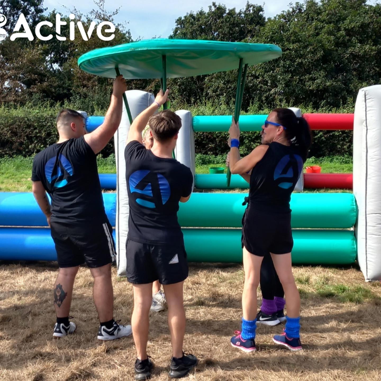 photo of some of the Active Jersey Team taking part in It's a Knockout Charity event