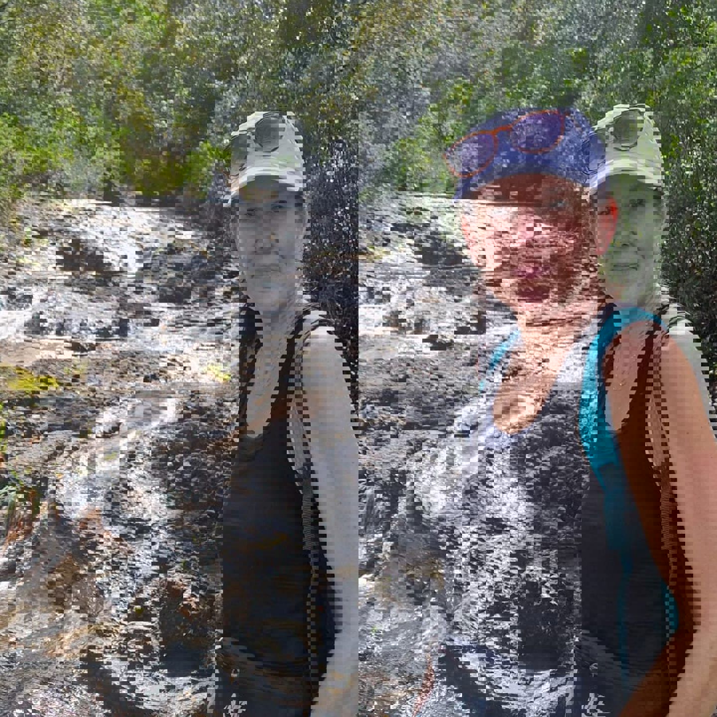 Photo of Sue by a waterfall